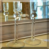 D24. Glass candlesticks. 